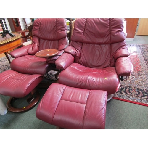 830 - STRESSLESS ARMCHAIRS & FOOTSTOOLS,  pair of burgundy, leather Stressless reclining armchairs, one wi... 