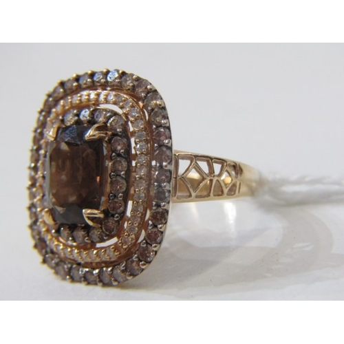 51 - SMOKY QUARTZ RING, 14ct yellow gold ring set an oval smoky quartz in 3 halos of diamonds with a 22mm... 