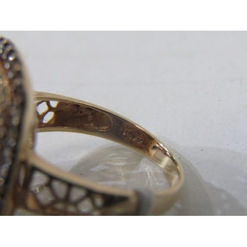 51 - SMOKY QUARTZ RING, 14ct yellow gold ring set an oval smoky quartz in 3 halos of diamonds with a 22mm... 