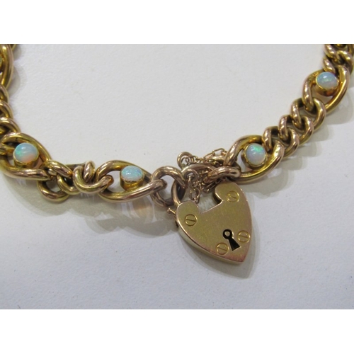49 - GOLD AND OPAL BRACELET, 9ct yellow gold curb link bracelet with padlock clasp, set with 8 opals, 10.... 