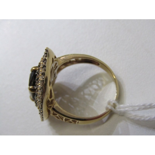 51 - SMOKY QUARTZ RING, 14ct yellow gold ring set an oval smoky quartz in 3 halos of diamonds with a 22mm... 