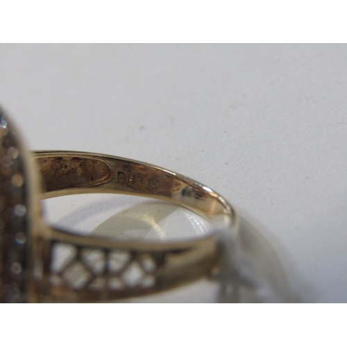 51 - SMOKY QUARTZ RING, 14ct yellow gold ring set an oval smoky quartz in 3 halos of diamonds with a 22mm... 