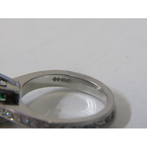 225 - EMERALD & DIAMOND RING, square form, cushion cut emerald, set in platinum with diamonds set around t... 