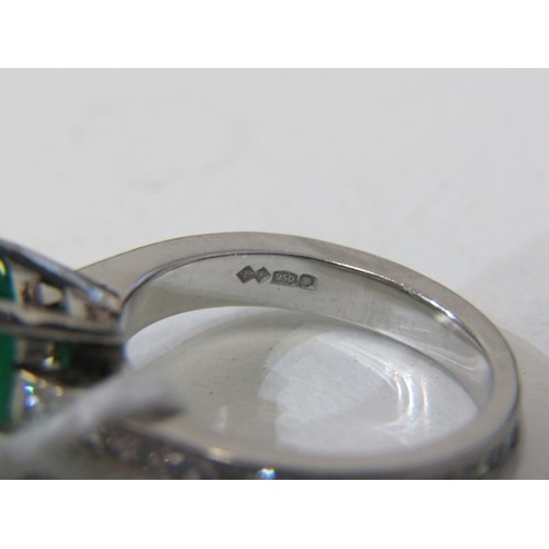 225 - EMERALD & DIAMOND RING, square form, cushion cut emerald, set in platinum with diamonds set around t... 