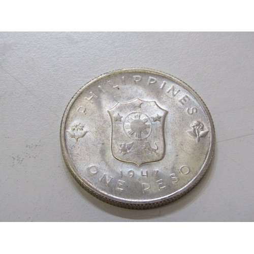 49 - 1947 Philippines Republic silver 1 Peso,  Liberation of the Philippines from the Japanese by Gen. Do... 