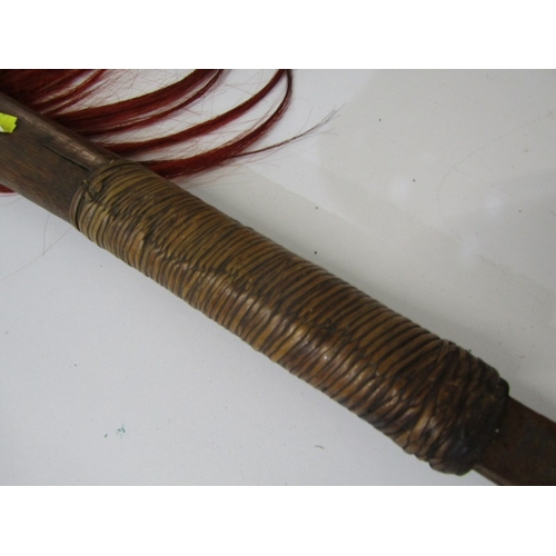 443 - ANTIQUE WEAPON, antique machete with metal blade and wooden handle, with coloured hair tassles, 81cm... 