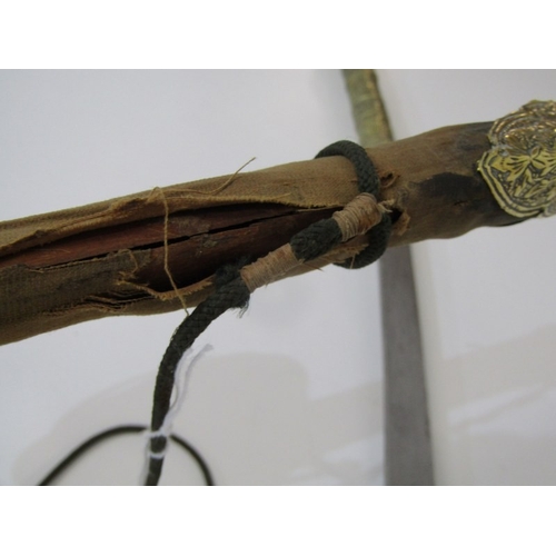 445 - FAR EASTERN SWORD, a far eastern possibly Malaysian sword with ornately decorated brass handle and p... 