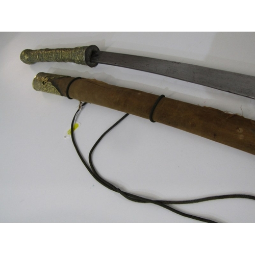 445 - FAR EASTERN SWORD, a far eastern possibly Malaysian sword with ornately decorated brass handle and p... 