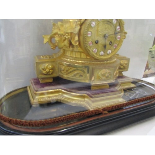 456 - FRENCH CLOCK, an ornate 19th century French gilt mantel clock, the top with urn surmounted with cher... 