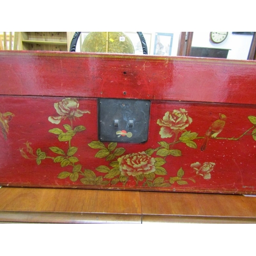 673 - ORIENTAL TRUNK, a Chinese red lacquered trunk, elaborately decorated with birds and flowers, with a ... 