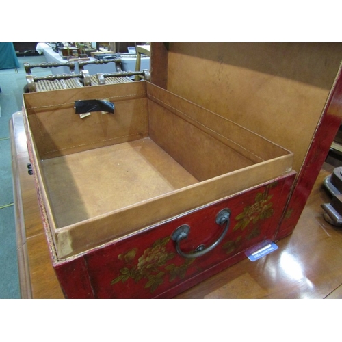 673 - ORIENTAL TRUNK, a Chinese red lacquered trunk, elaborately decorated with birds and flowers, with a ... 