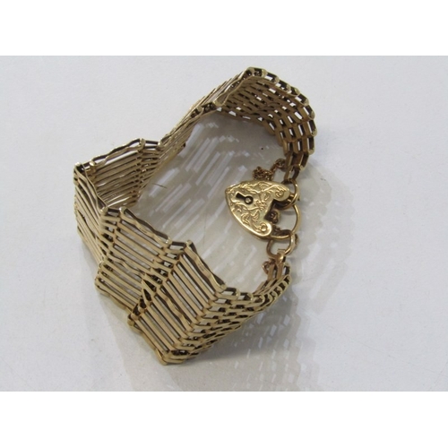 66 - GOLD GATE LINK BRACELET WITH PADLOCK CLASP, 9ct yellow gold 11 bar gate link bracelet on 9ct gold cl... 
