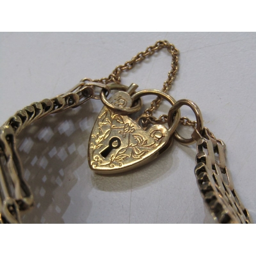 66 - GOLD GATE LINK BRACELET WITH PADLOCK CLASP, 9ct yellow gold 11 bar gate link bracelet on 9ct gold cl... 