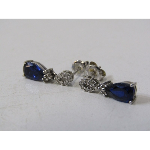 76 - SAPPHIRE DROP EARRINGS, pair of 9ct white gold stud earrings, set a pair of tear drop sapphires, 1.5... 