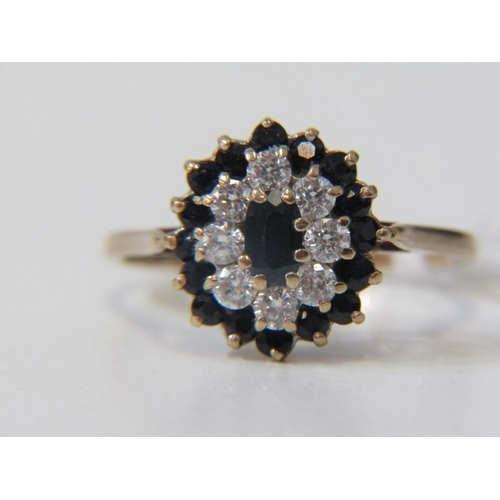 87 - SAPPHIRE CLUSTER RING, 9ct yellow gold ring, set a cluster of sapphires and CZs, size O