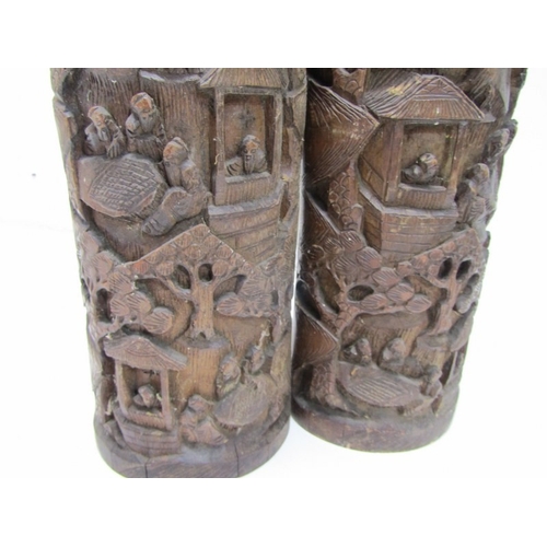 90 - ORIENTAL BRUSH POTS, a pair of 19th Century Chinese bamboo brush pots, both ornately carved with fig... 