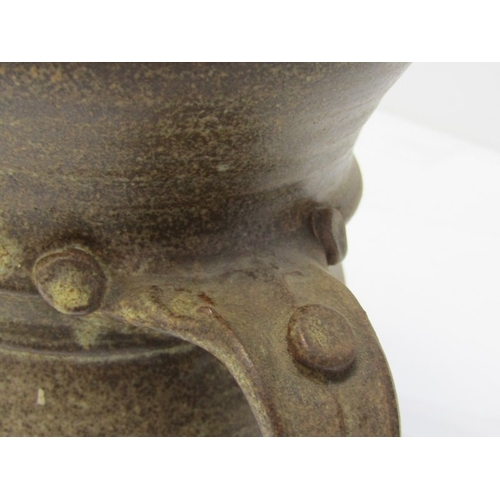 91 - STUDIO POTTERY, a studio pottery jug with light and medium brown glaze, twist handle (chip), 15cm he... 