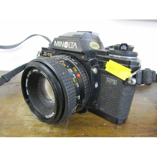 58 - PHOTOGRAPHY - OLYMPUS OM-1 CAMERA, a vintage Olympus OM-1 film camera with a 35mm single lens reflex... 