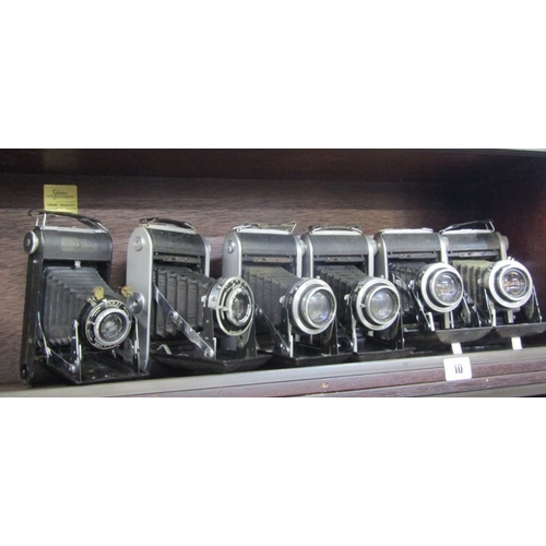 10 - PHOTOGRAPHY, ENSIGN vintage cameras; Ensign Ranger special folding camera, 4 Ensign Selfix 820 foldi... 