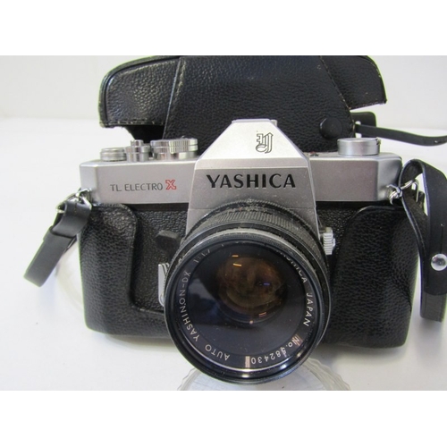 16 - PHOTOGRAPHY, various vintage cameras;  cased Yashica TL Electro X with accessories, Praktica BMS ele... 