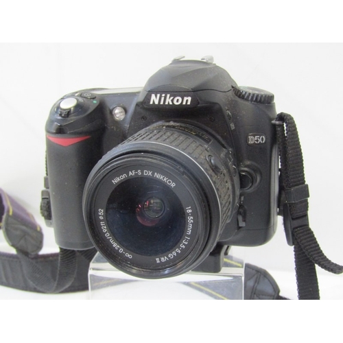 4 - PHOTOGRAPHY, Nikon DX VR D50 camera with Nikon AF-S DX Nikkor 18-55mm lense and strap, a Nikon EM M9... 
