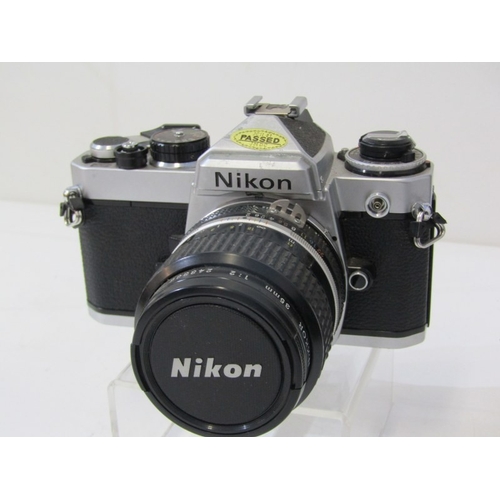 4 - PHOTOGRAPHY, Nikon DX VR D50 camera with Nikon AF-S DX Nikkor 18-55mm lense and strap, a Nikon EM M9... 