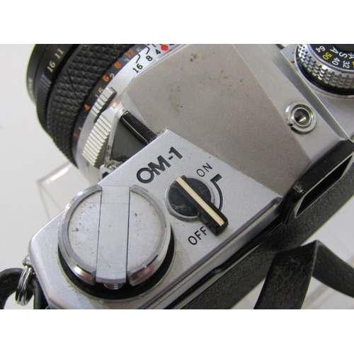58 - PHOTOGRAPHY - OLYMPUS OM-1 CAMERA, a vintage Olympus OM-1 film camera with a 35mm single lens reflex... 