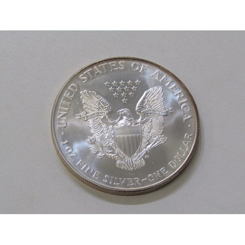 20 - 2000 USA ‘Walking Liberty’ Silver Eagle Dollar.  High grade example with sharp edges & edge rainbow ... 