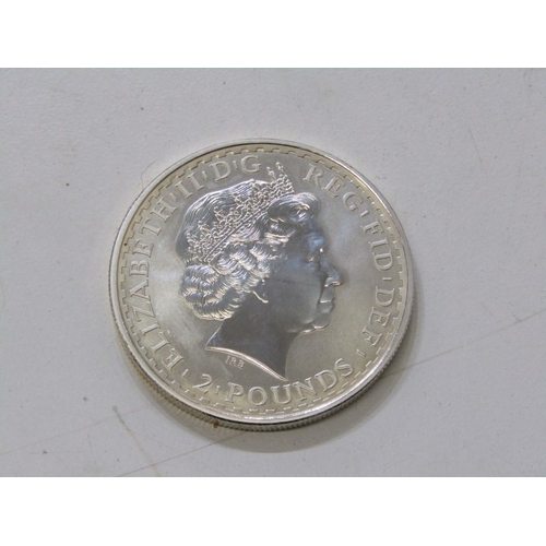 25 - 2000 Elizabeth II Fine Silver Britannia 2 Pounds in high grade. One ounce of .999 silver fineness.