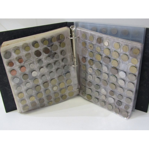 51 - A large album of modern mostly European coins with some having silver content