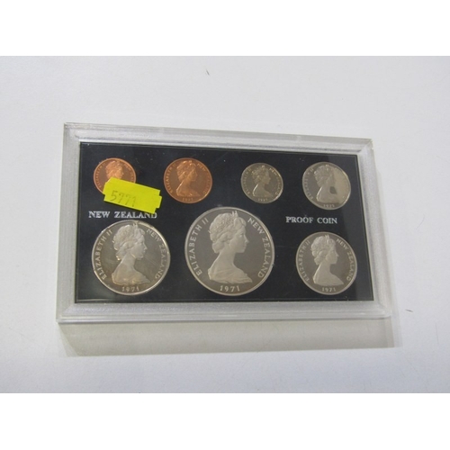 53 - A tub of World coins including a 1971 New Zealand Dollar to cent proof 7-coin set together with a bo... 