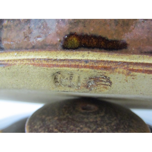 25 - WENFORD POTTERY CASSEROLE DISH, a lidded casserole dish with a dark brown glaze, incised with wavy l... 