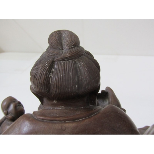 1 - ORIENTAL CARVING, a Chinese carved wood sculpture depicting a seated bearded man with a young boy on... 