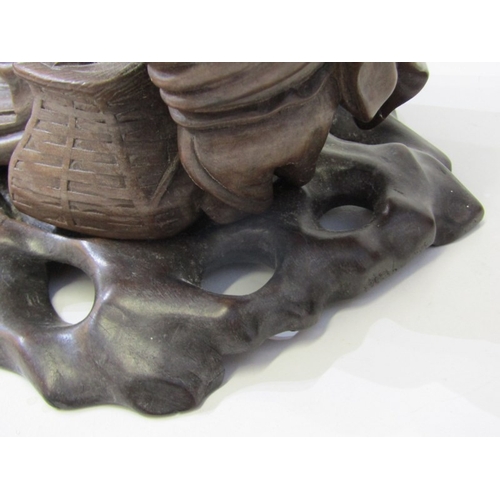 1 - ORIENTAL CARVING, a Chinese carved wood sculpture depicting a seated bearded man with a young boy on... 