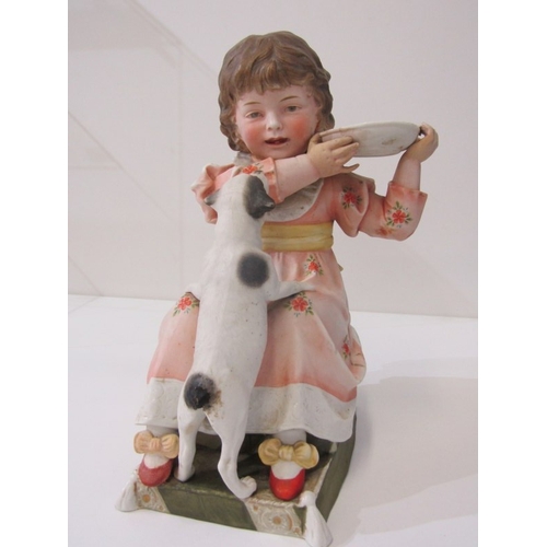 13 - BISQUE PORCELAIN FIGURE, a late 19th Century German bisque porcelain figurine of a girl with dog (re... 