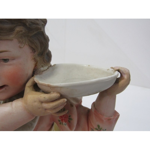 13 - BISQUE PORCELAIN FIGURE, a late 19th Century German bisque porcelain figurine of a girl with dog (re... 
