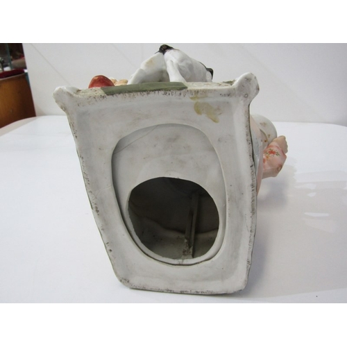 13 - BISQUE PORCELAIN FIGURE, a late 19th Century German bisque porcelain figurine of a girl with dog (re... 
