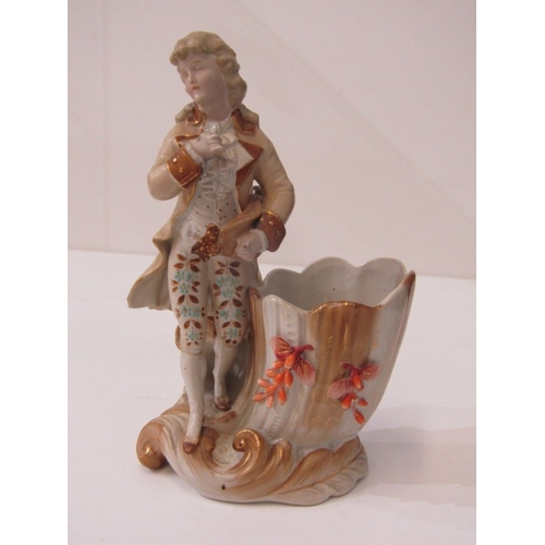 14 - PORCELAIN FIGURINES, a pair of 19th century continental candle holders with boy and girl to each. 18... 