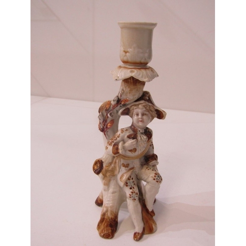 14 - PORCELAIN FIGURINES, a pair of 19th century continental candle holders with boy and girl to each. 18... 