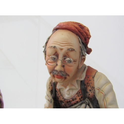 15 - CAPO DI MONTE, a Capo di Monte figurine depicting a cobbler and child, signed 'Rori' c.1974. 24.5cm ... 