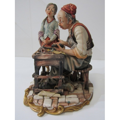 15 - CAPO DI MONTE, a Capo di Monte figurine depicting a cobbler and child, signed 'Rori' c.1974. 24.5cm ... 