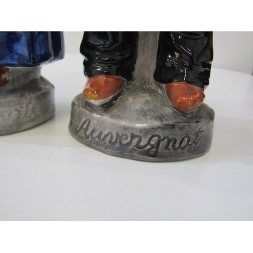 16 - ITALIAN POTTERY FIGURES, a pair of Italian pottery figures depicting a man and woman, him holding It... 