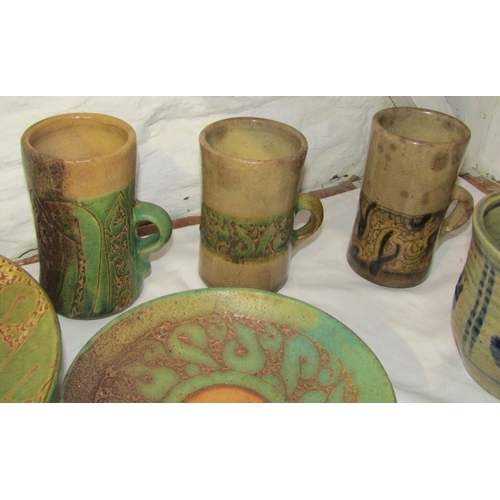 19 - STUDIO POTTERY, 12 pieces of various studio pottery, some bearing initials 'C.B.', including bowls, ... 