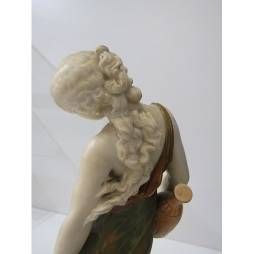 2 - ROYAL WORCESTER FIGURE, a Royal Worcester blush ivory figure of a scantily clad woman, holding a wat... 