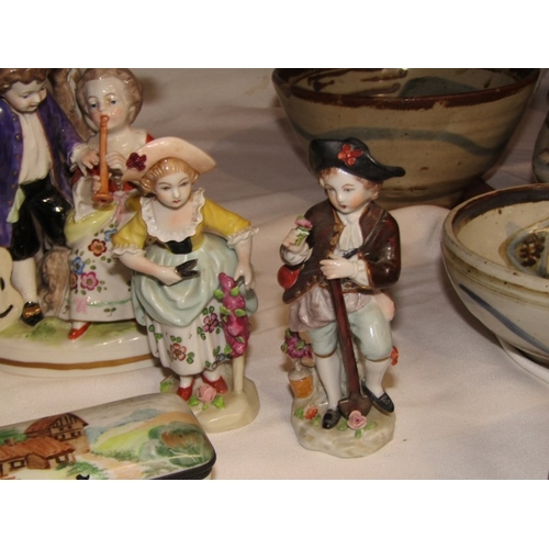 21 - CERAMICS, a 19th century Staffordshire figure depicting boys collecting birds eggs, a similar reprod... 