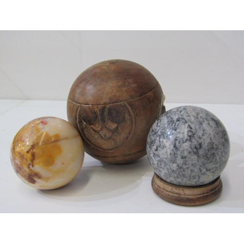 23 - GLASS PAPERWEIGHTS, 3 various glass paperweights, together with a stone ball on stand, another stone... 