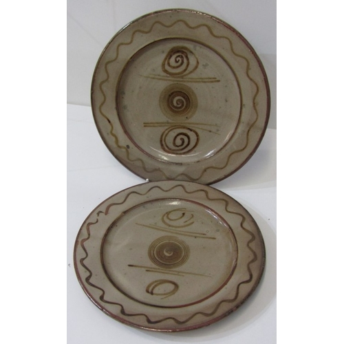 27 - WENFORD BRIDGE POTTERY PLATES,  2 earthenware plates, both with incised and sgraffito scrolling deco... 