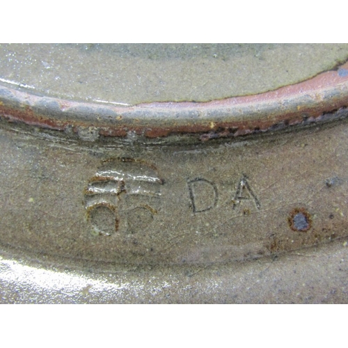 27 - WENFORD BRIDGE POTTERY PLATES,  2 earthenware plates, both with incised and sgraffito scrolling deco... 