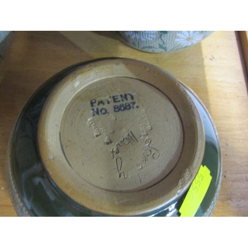 36 - FLORAL JARDINIERES, a Lovatts Pottery green bodied jardinière with white and green daisy decoration.... 