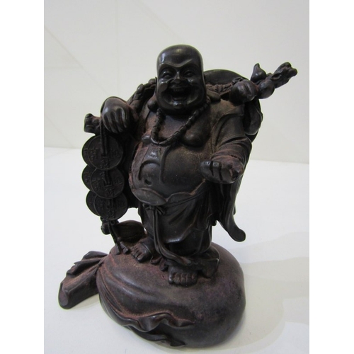 42 - ORIENTAL CARVINGS, a vintage Chinese carved wooden statue depicting a sage, such as Shou Xing, in th... 